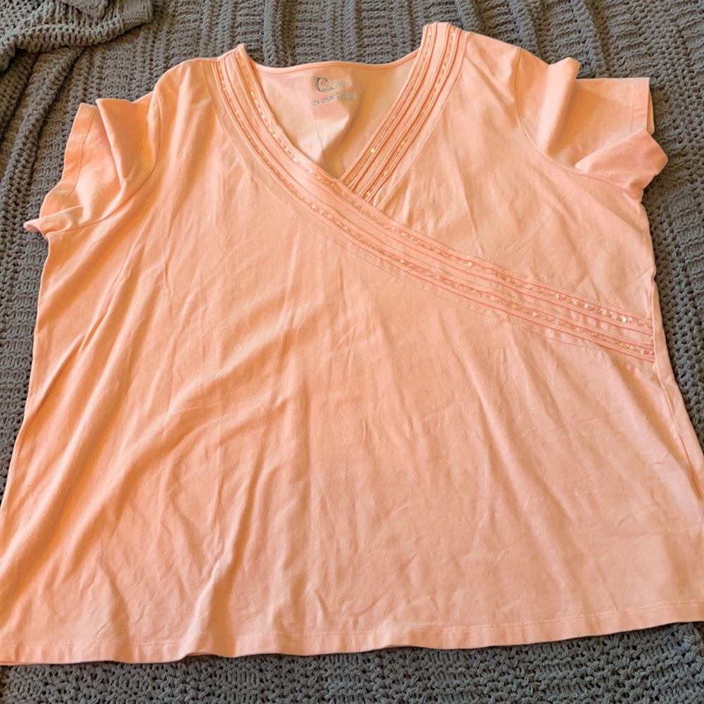 Size 24/26 Light orange Shirt with sequin and bead detail.
